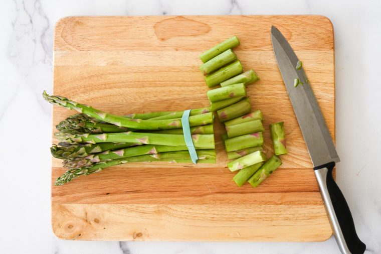cutting ends off of asparagus spears