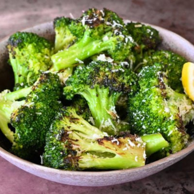 Bowl of garlicky roasted broccoli.