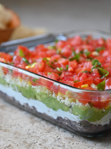 7 layer dip in serving dish.