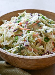 Classic coleslaw in a wooden bowl.