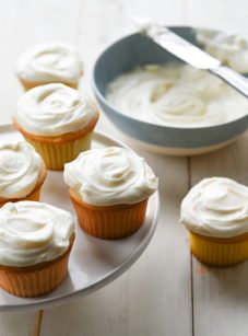 Cream cheese frosting and vanilla cupcakes.