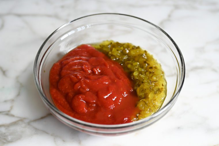 chili sauce, pickle relish and hot sauce in bowl