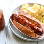 Hot dog topped with spicy relish.