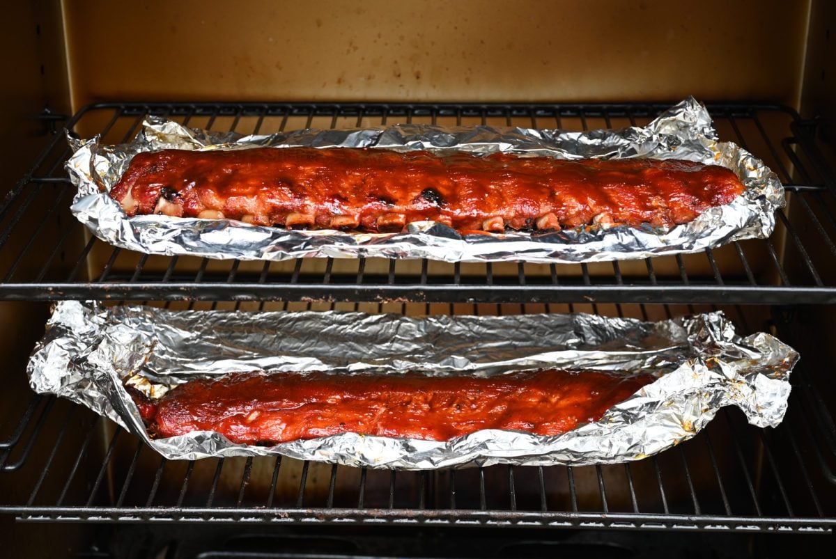 setting the sauce in the smoker