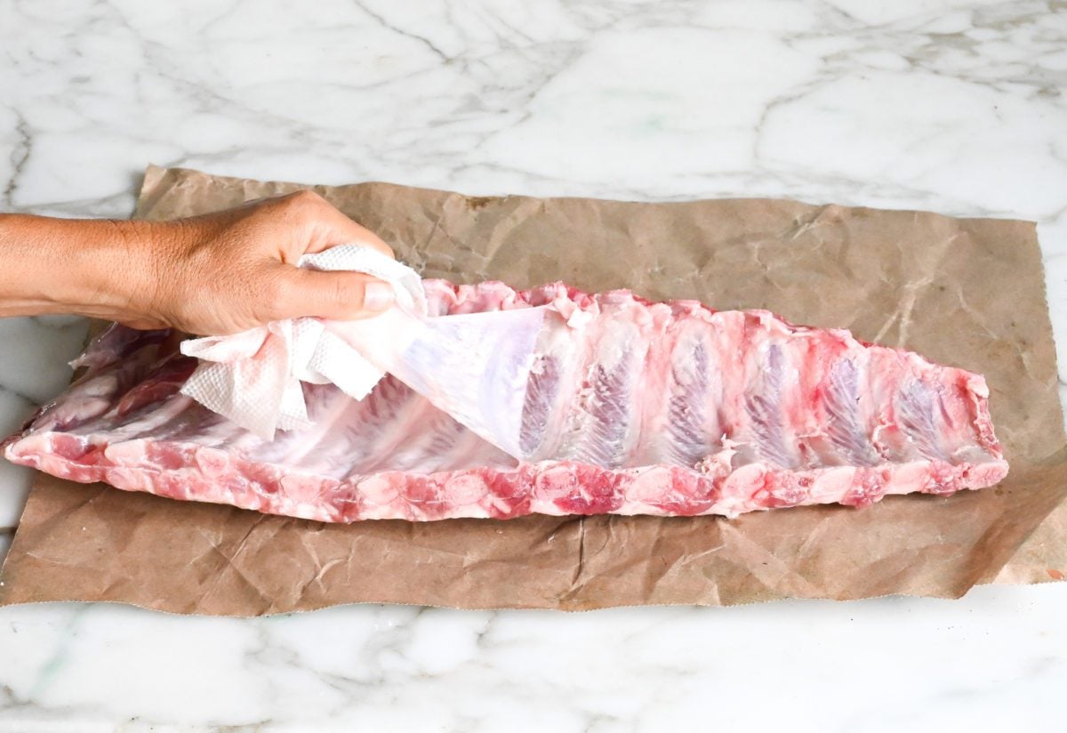 pulling off the baby back ribs membrane