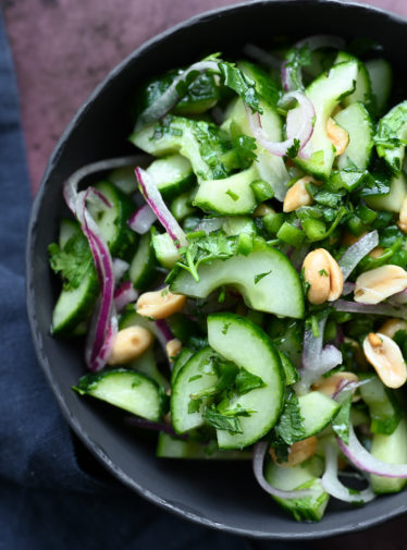 Thai cucumber salad with peanuts in a bowl.