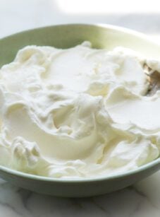 bowl of whipped cream with spoon