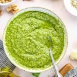 pesto sauce in bowl with linen napkin