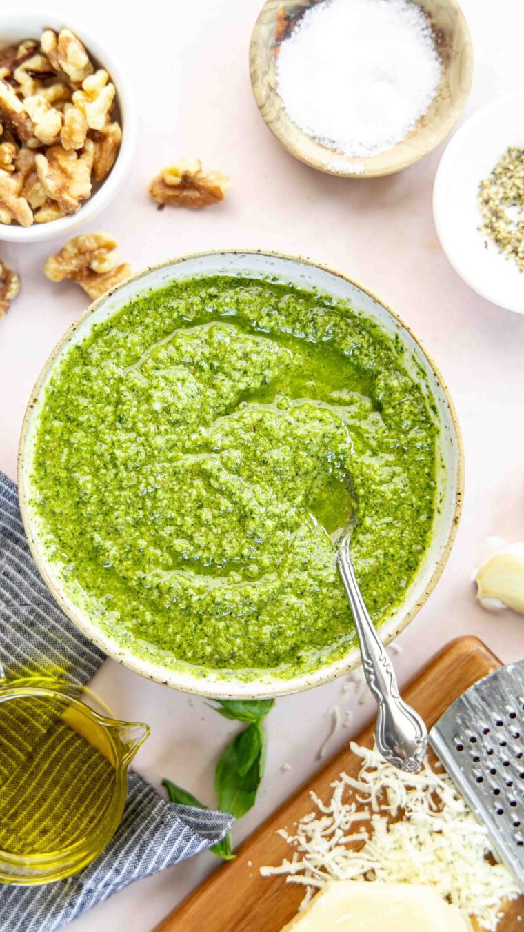 pesto sauce in bowl with linen napkin