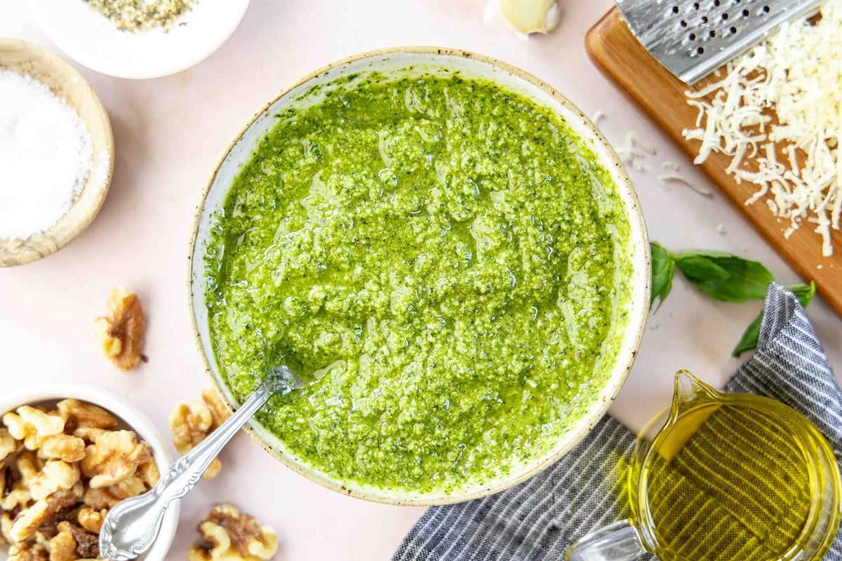pesto sauce in bowl with linen napkin