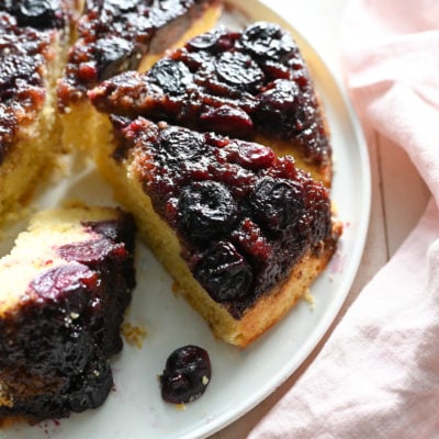 Sliced cherry cornmeal upside-down cake.
