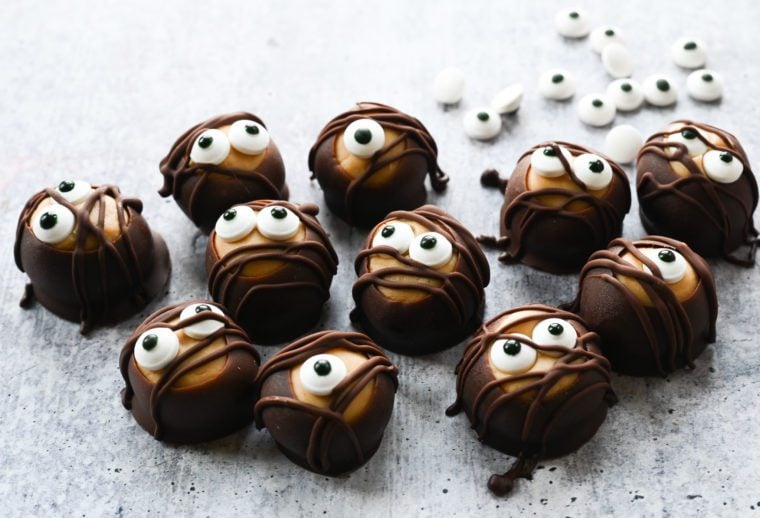 Buckeyes decorated with eyes to look like mummies.