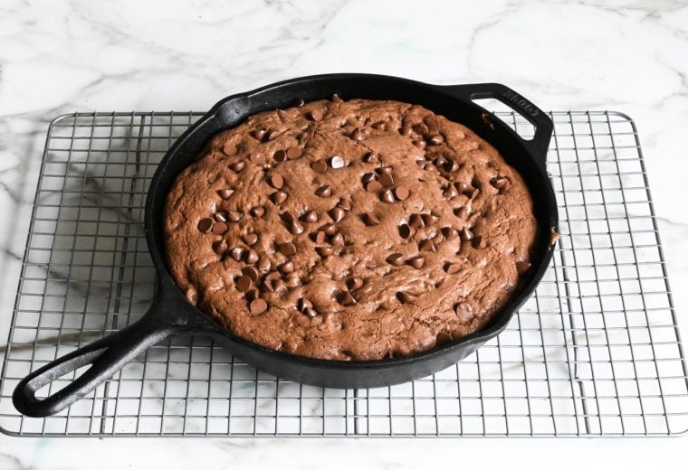 baked skillet cookie cooling on rack