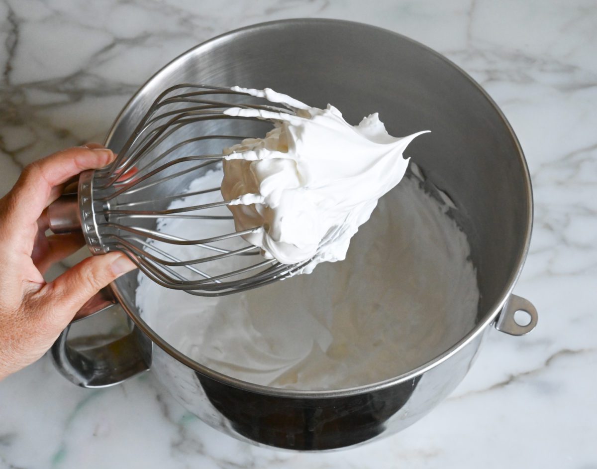 stiff meringue peaks on the whisk attachment