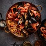 Spanish paella in beautiful copper paella pan.