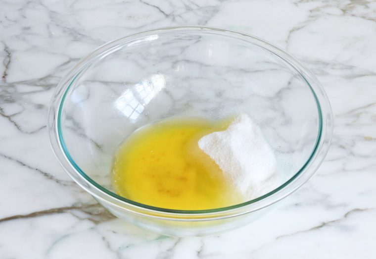 melted butter and sugar in mixing bowl