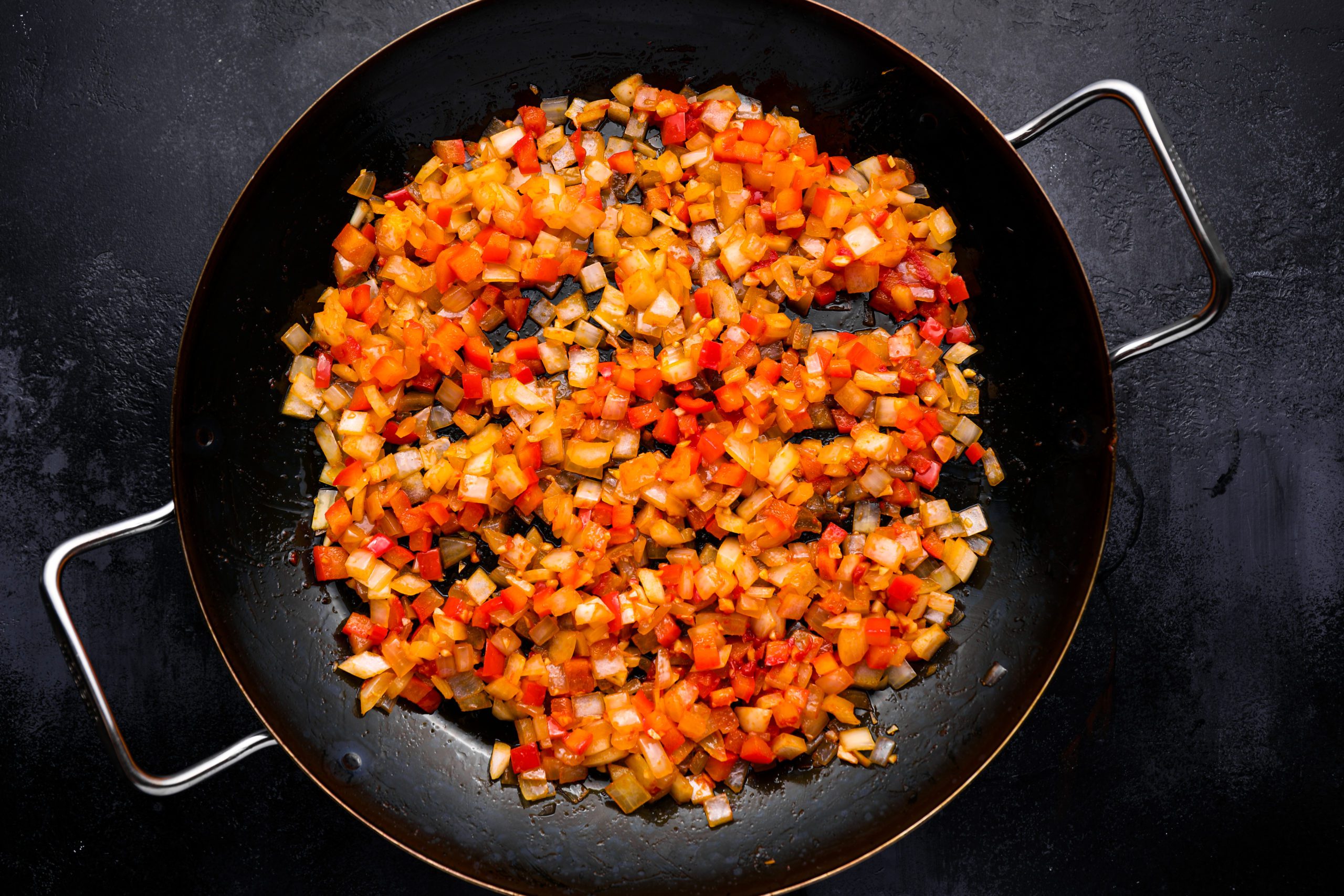 Vegetables cooking in a pan.