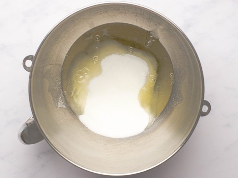egg whites and sugar in mixing bowl