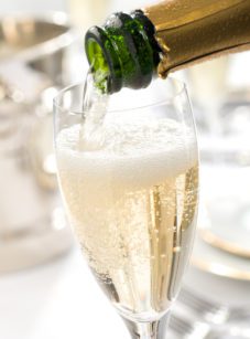 Champagne pouring into a glass.