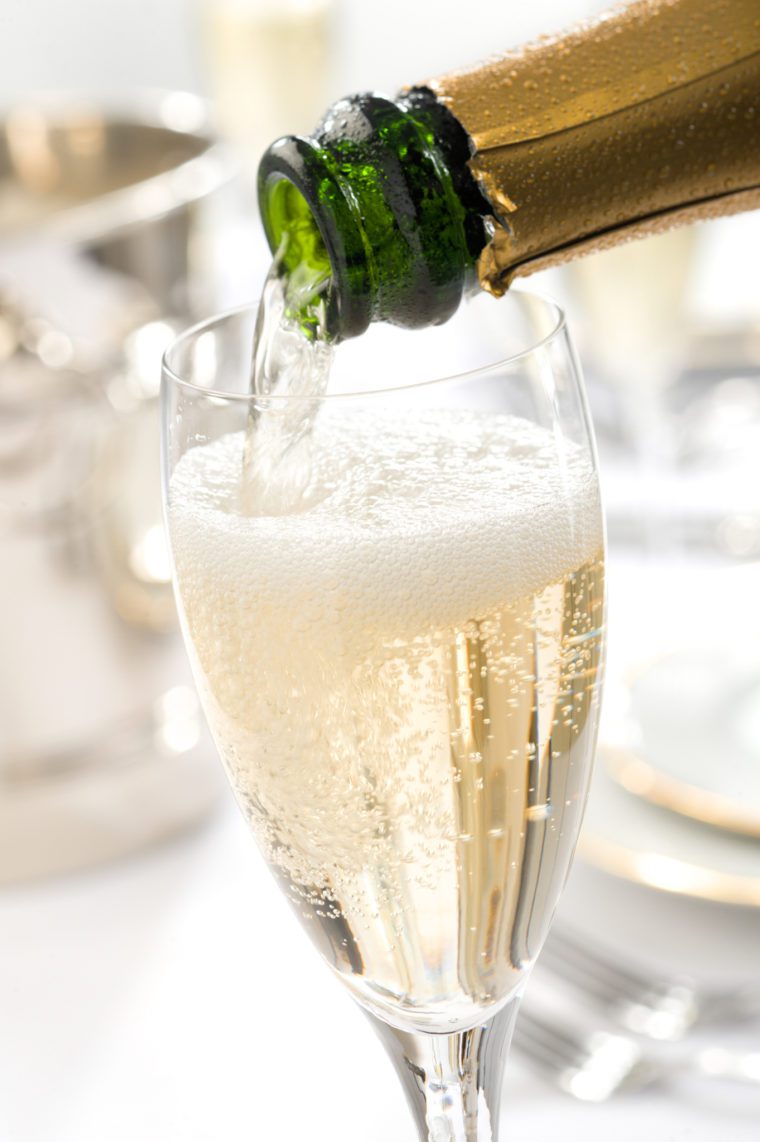 Champagne pouring into a glass.