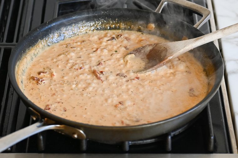 sauce simmering in skillet