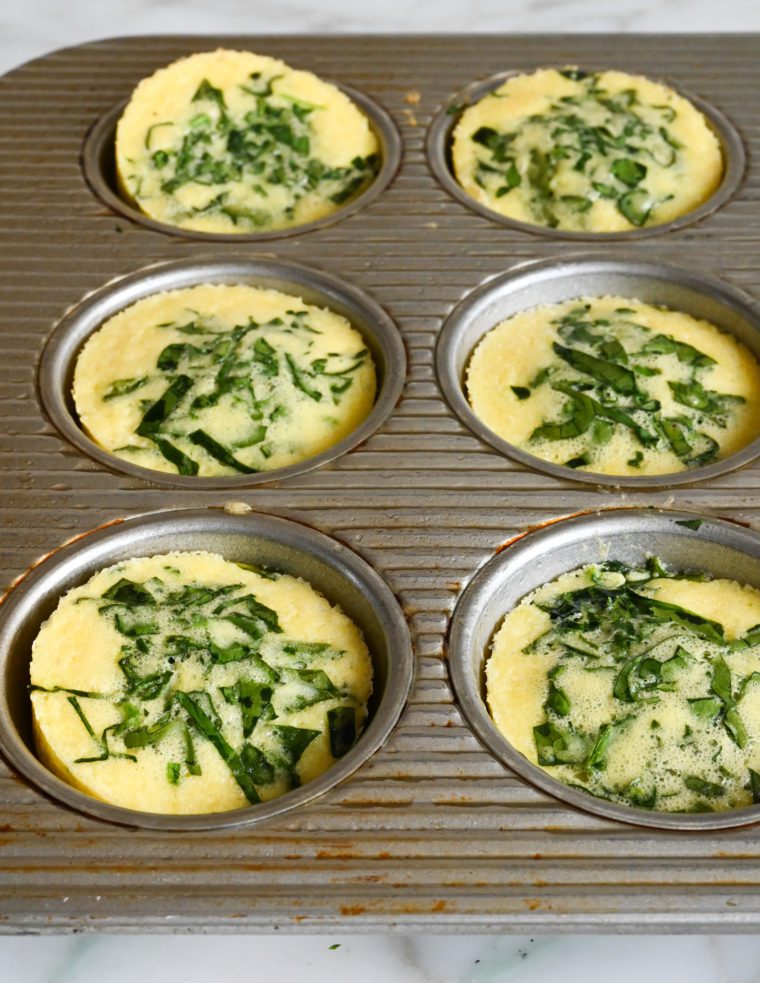 egg bites in muffin tin, pulling away from the edges