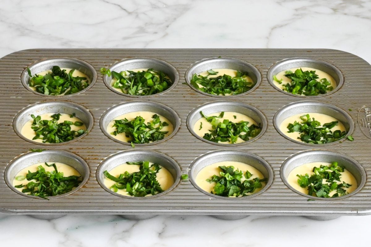 spinach and scallions on egg bite batter
