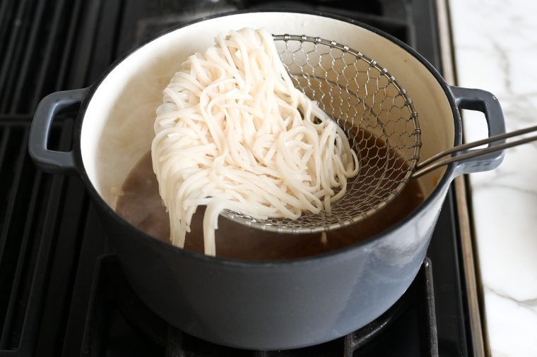 removing noodles from broth