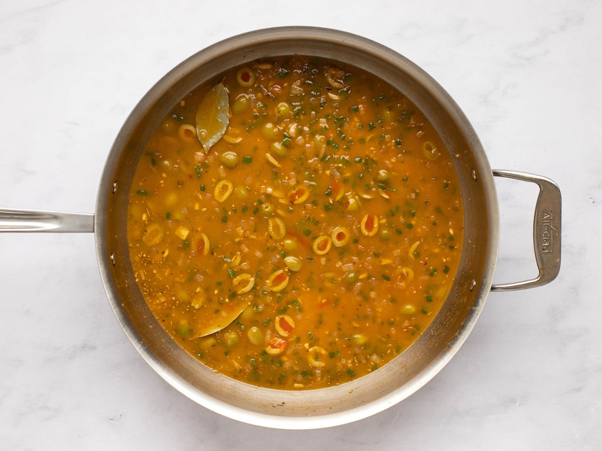 bringing the broth to a simmer