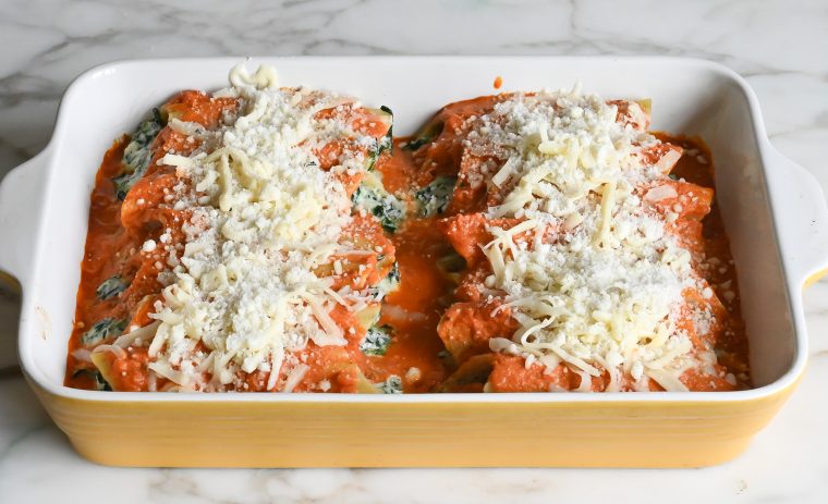 baked manicotti covered with cheese