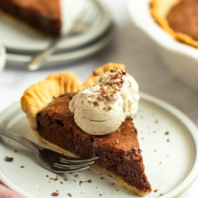 sliced chocolate brownie pie with ice cream