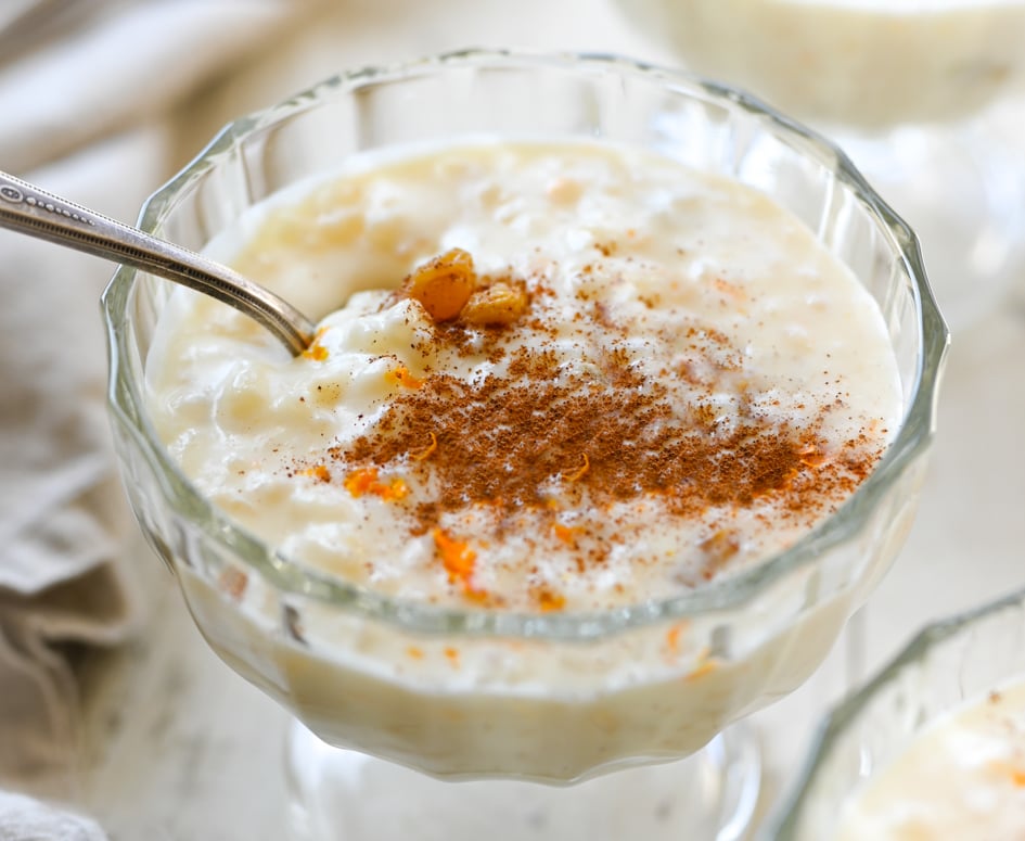 rice pudding in stemmed glass with spoon