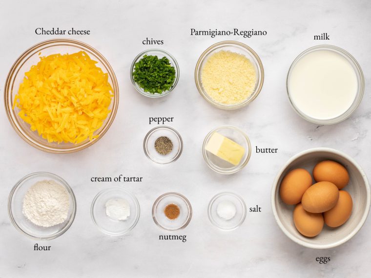 Souffle ingredients including cream of tartar, chives, and butter.