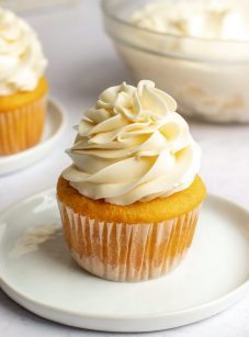 Cupcake topped with Swiss meringue buttercream.