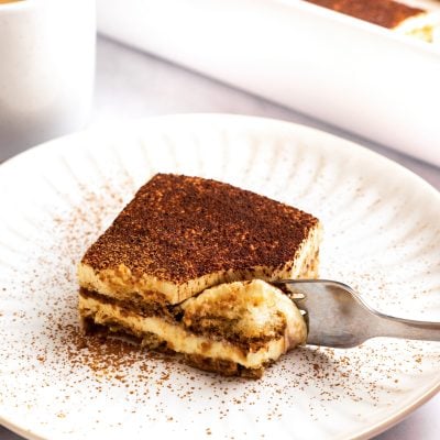 Slice of tiramisu on plate.