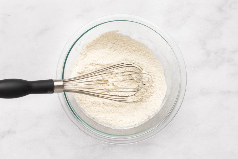 whisking flour, salt and baking powder in bowl