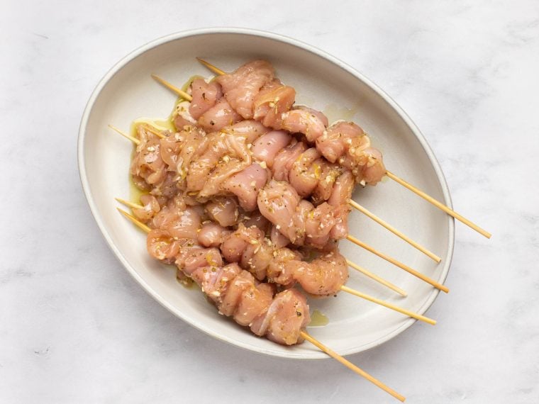 chicken threaded onto skewers