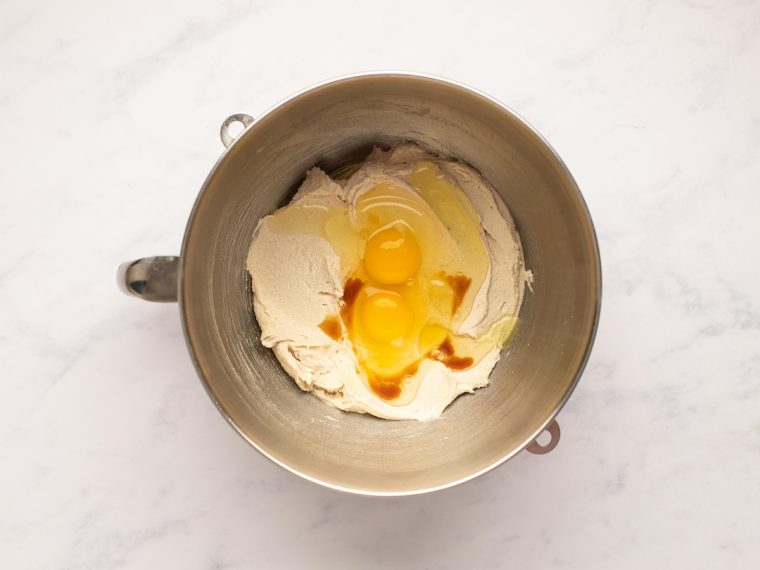vanilla and eggs added to mixing bowl