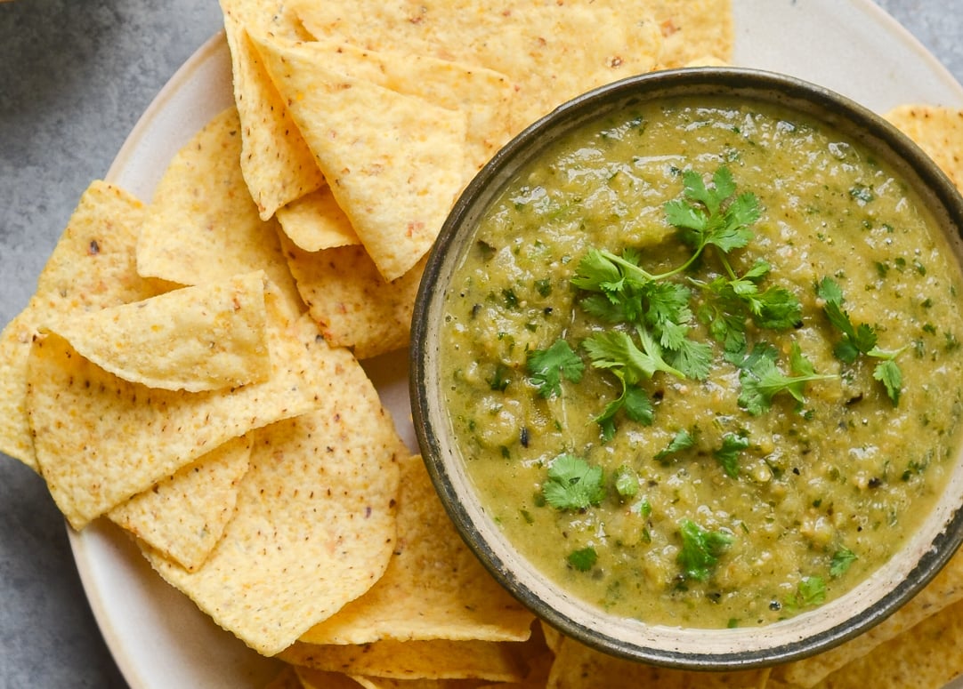 salsa verde in bowl with tortilla chips