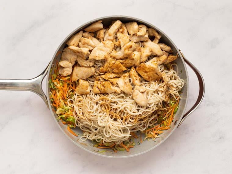 noodles, chicken and remaining sauce added to pan