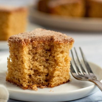 slice of apple cider donut cake on plate