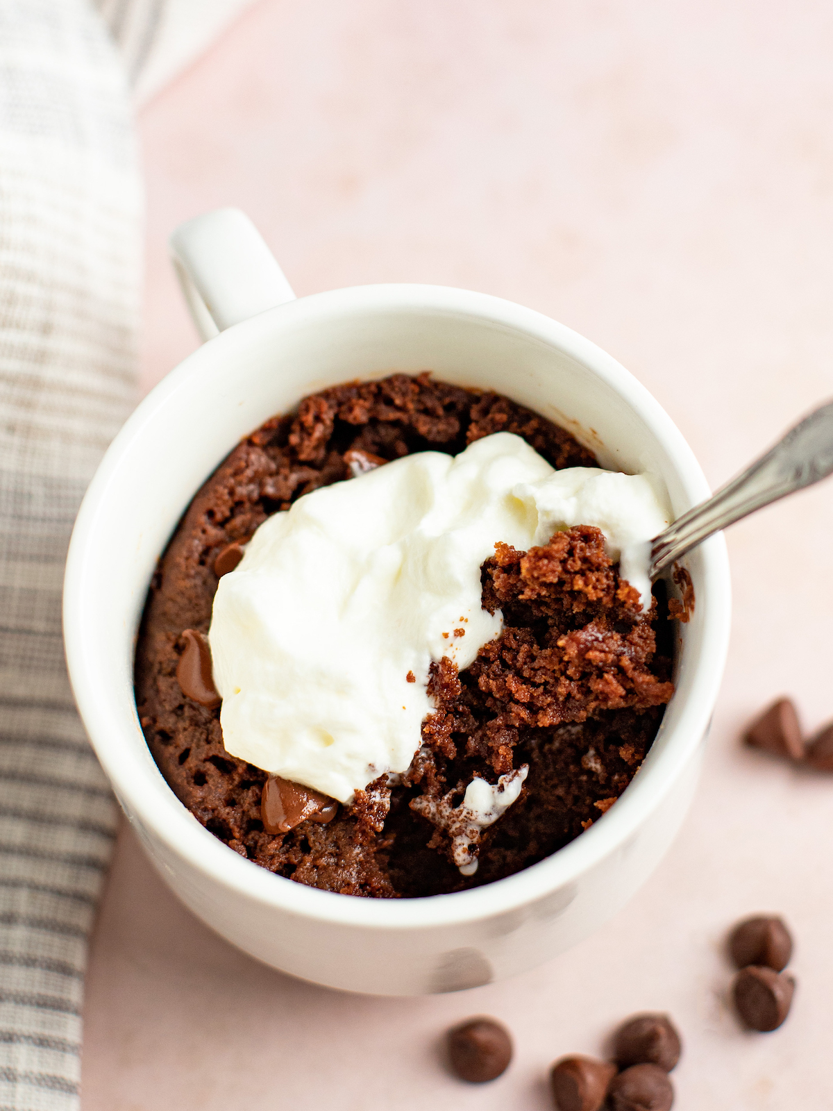 Partially-eaten brownie in a mug.