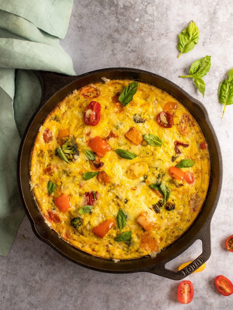 baked frittata with skillet handle covered