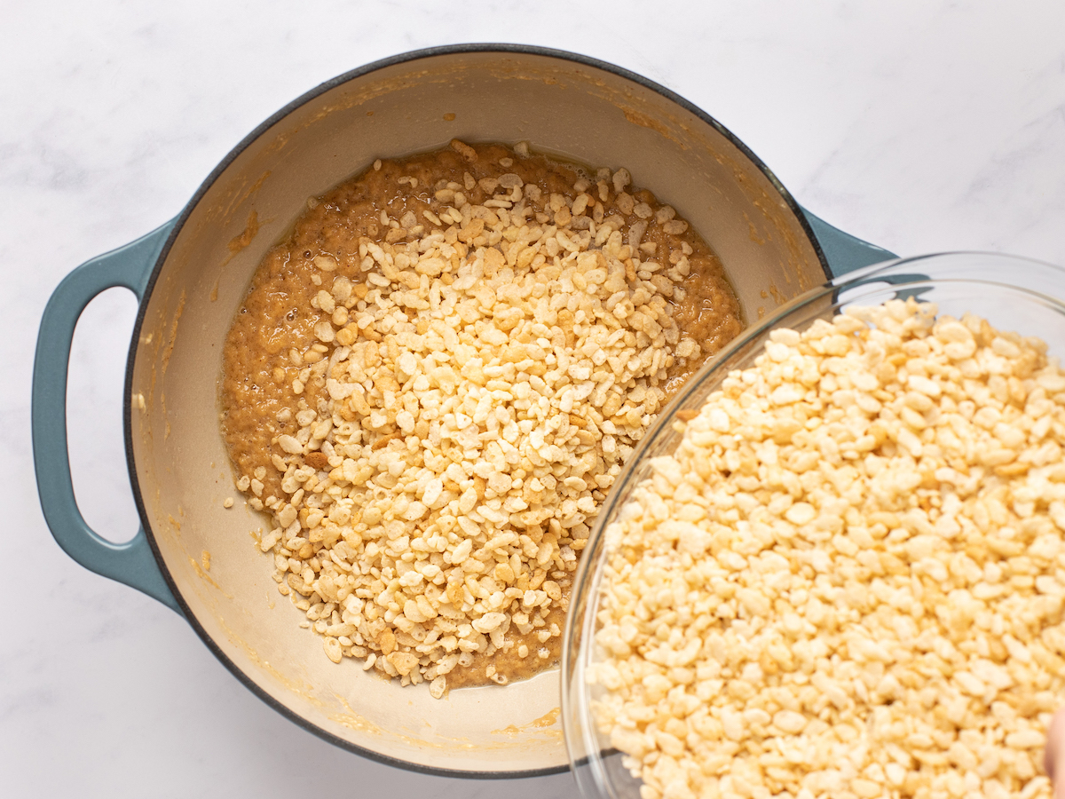 adding cereal to dutch oven