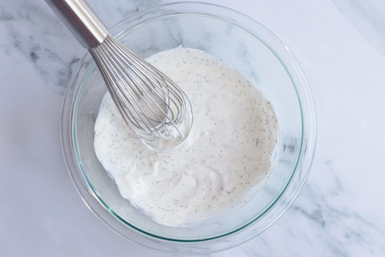 mayonnaise, lemon juice, garlic, dill, and salt whisked together