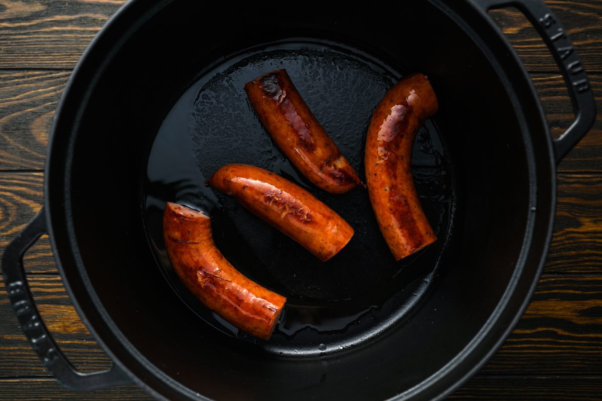 browned andouille sausage in dutch oven
