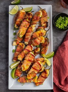 jalapeno poppers on platter with drinks