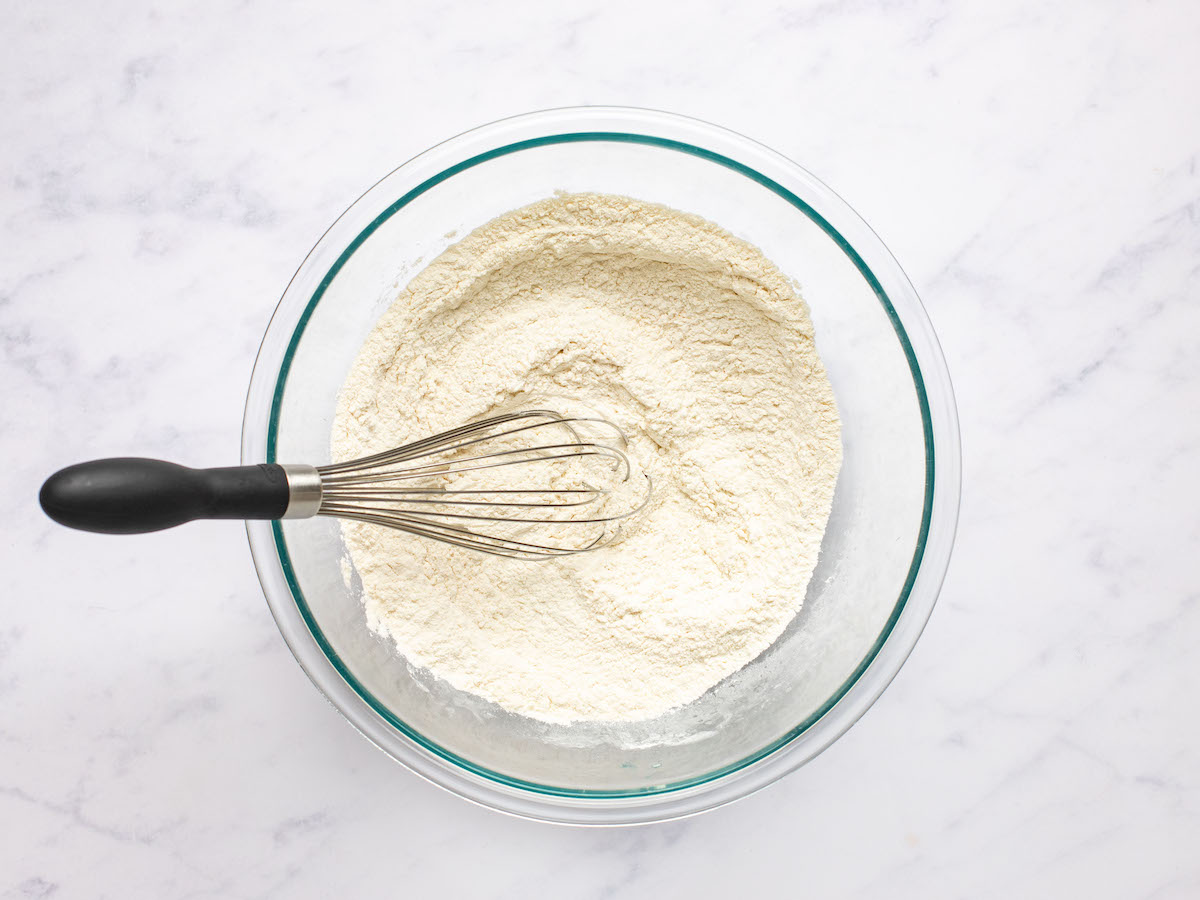 whisking flour, cornstarch, baking powder, baking soda, salt, and garlic powder