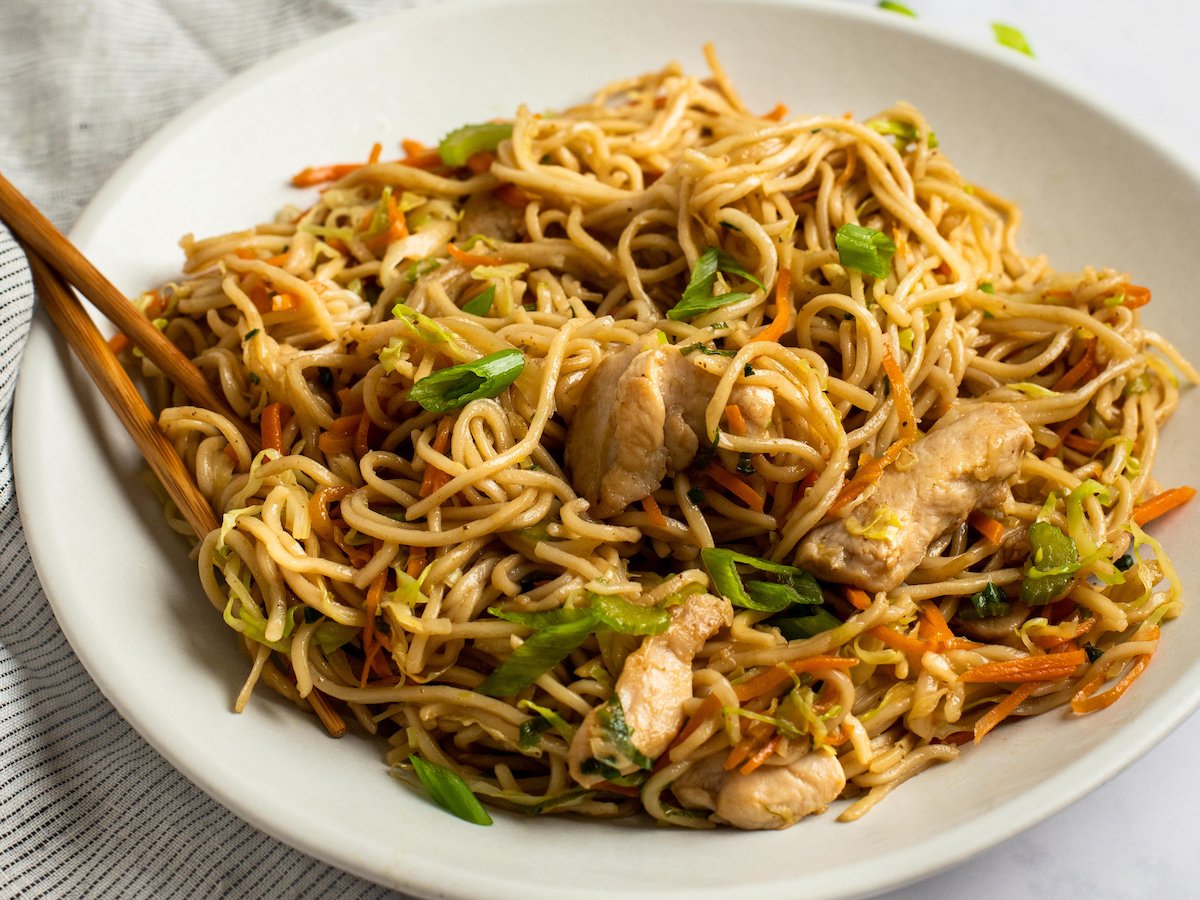 chicken chow mein in large white bowl