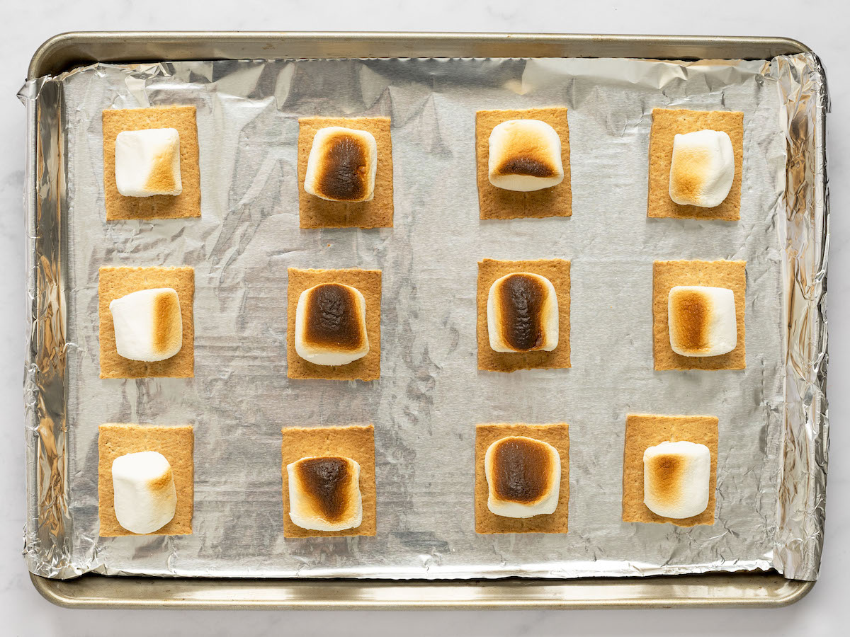 charred marshmallows on baking sheet